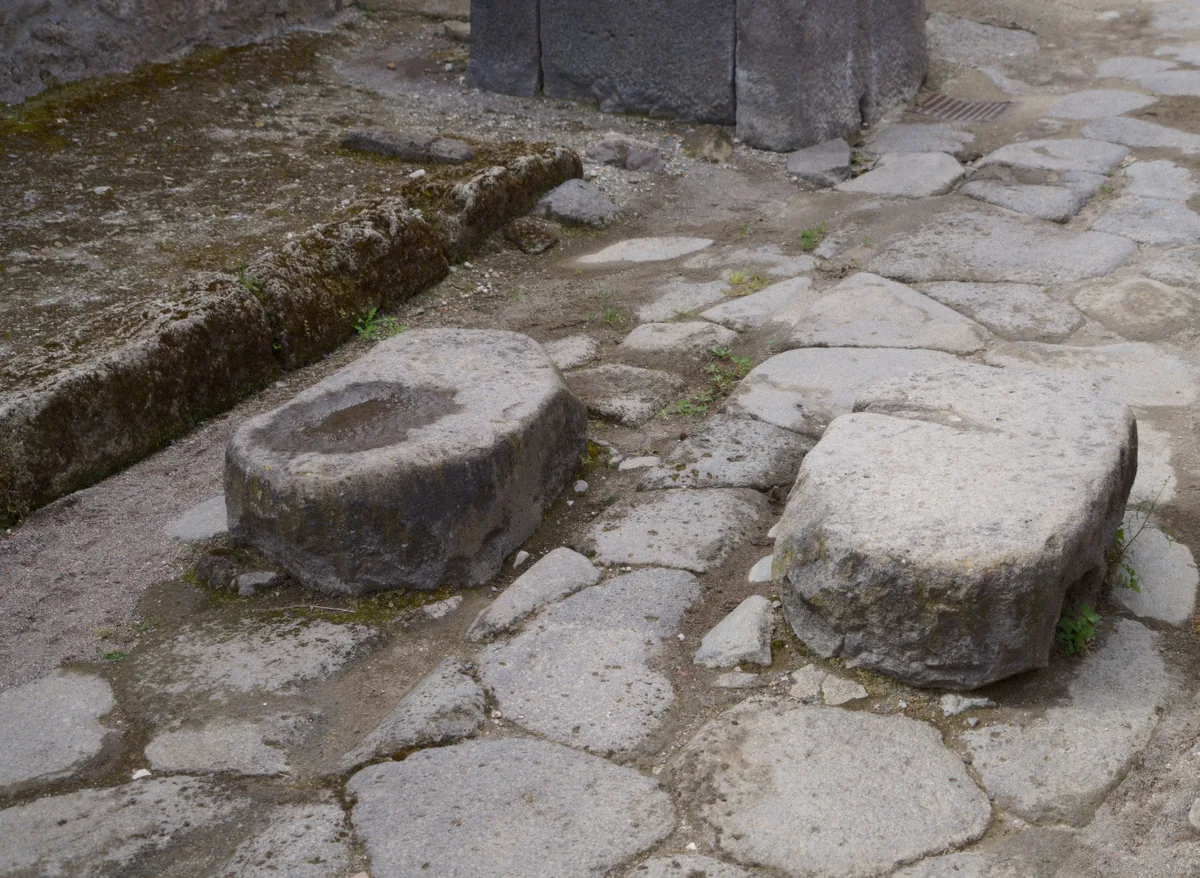 Ancient stepping stones on Via di Castricio in Pompeii walked on every private tour of the excavations