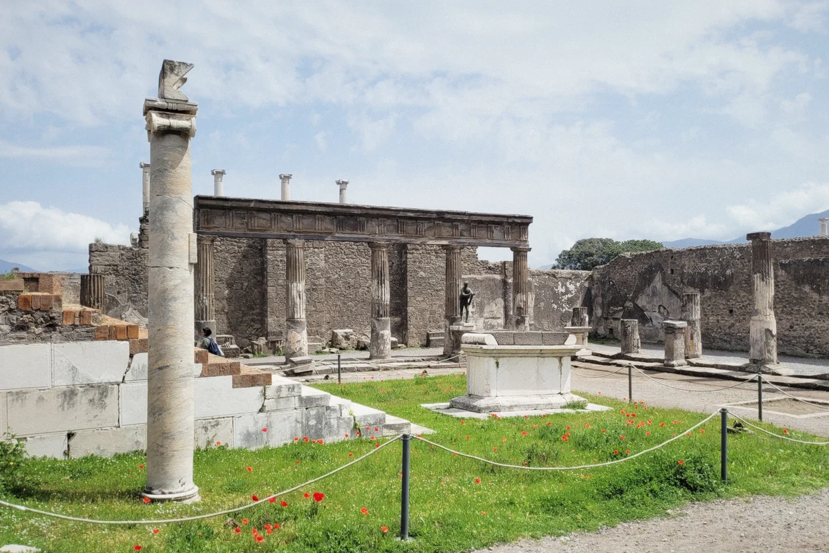 The Temple of Apollo columns beside the Forum of Pompeii on a private guided tour